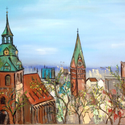 Das Gemälde Frühling über den Dächern in Lüneburg zeigt den Blick vom Lüneburger Kalkberg auf die Stadt bei frühlingshaftem Ambiente. Zu sehen sind der Lüneburger Wasserturm, die Michaeliskirche und die Johanniskirche sowie einie kleinere Gebäude im Hintergrund. Verschiedene Bäume tragen die ersten Frühlingsblätter. Vorherrschende Farben: hellblau, braun, türkis, grün, beige, elfenbein.